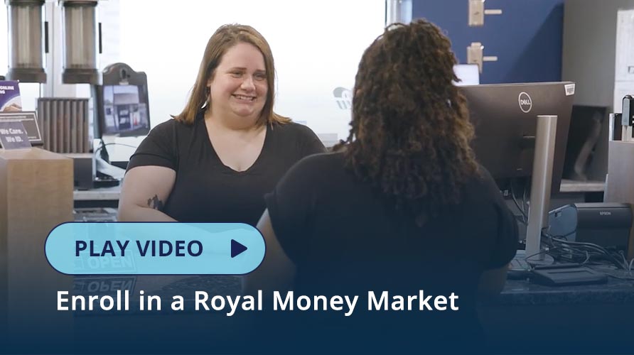 Team member working with a Member at a Royal Office counter