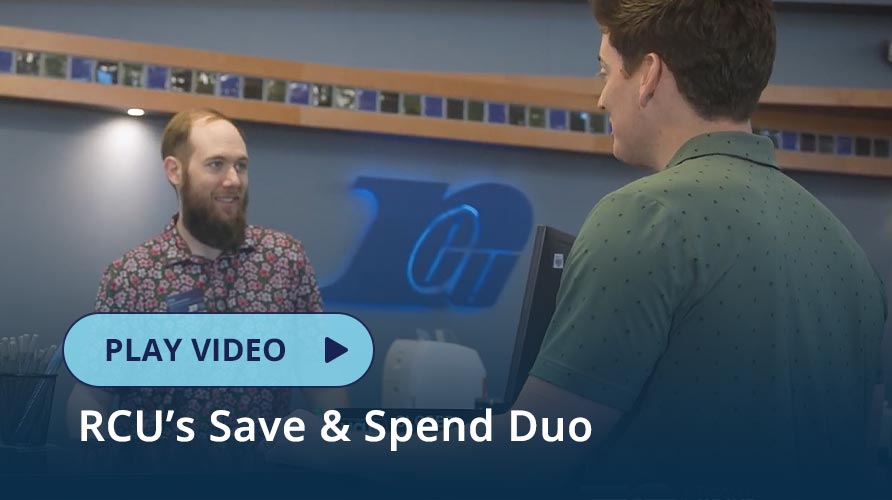 Photo of a man standing in front of a Royal Team Member