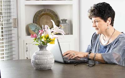 Business woman working on laptop