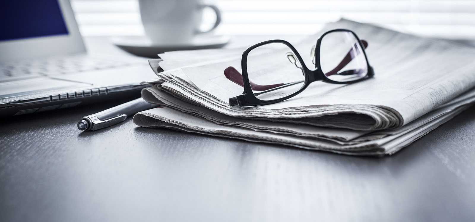 Glasses and newspaper