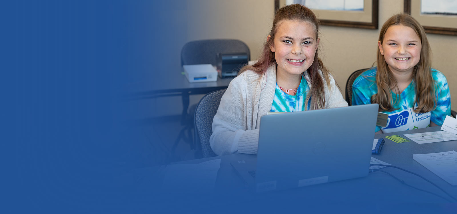 Two students working together on financial education