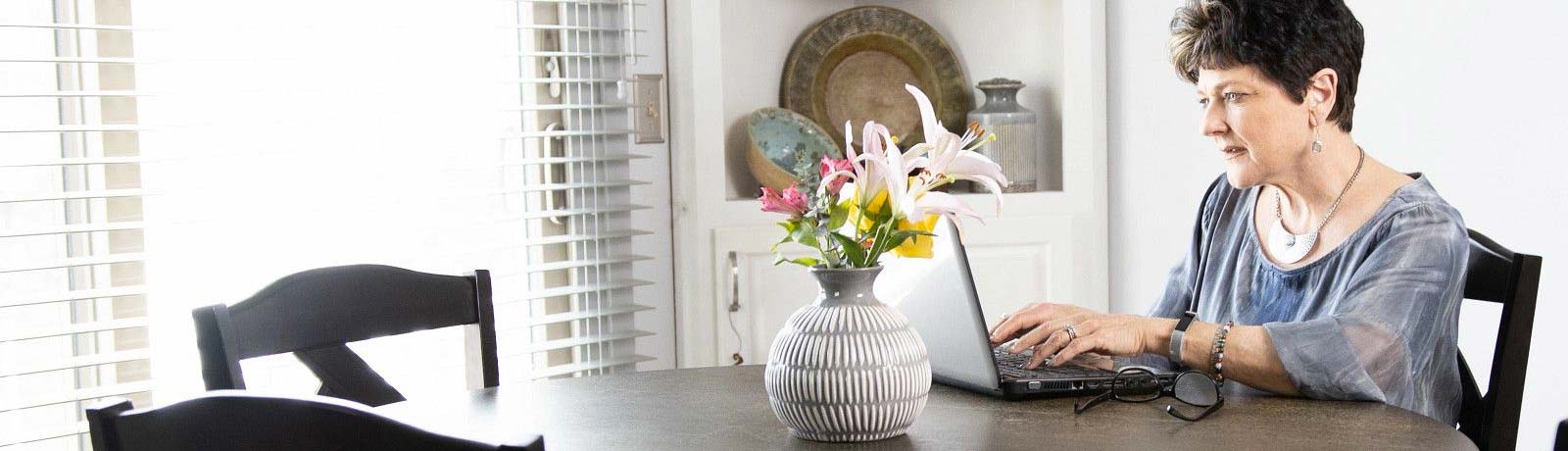 Woman sitting at computer