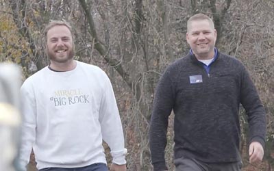 Rock Creek owner walking the property with an RCU Business Lender