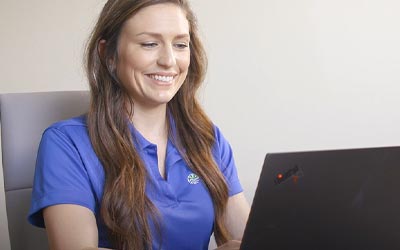 Woman using online banking to make an easy payment